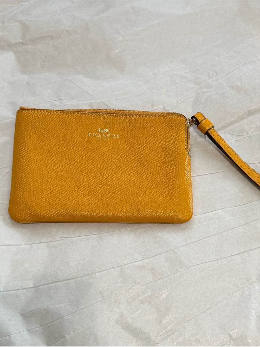 Coach Gold Leather Wristlet with Silver Logo